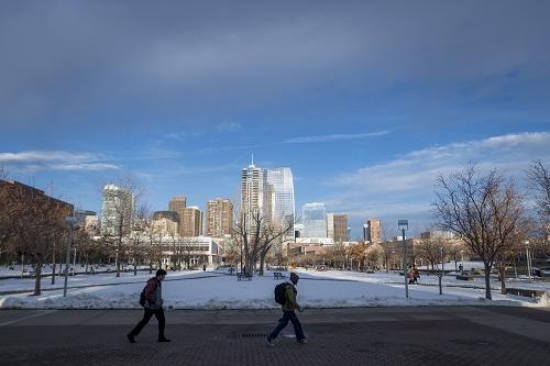 Students walking across Auraria Campus in winter.